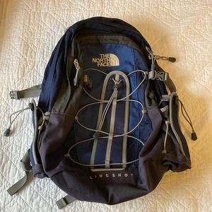 The North Face blue slingshot backpack
